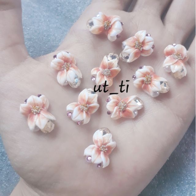 hoa ôm đá khối+ngọc ,nhụy bi