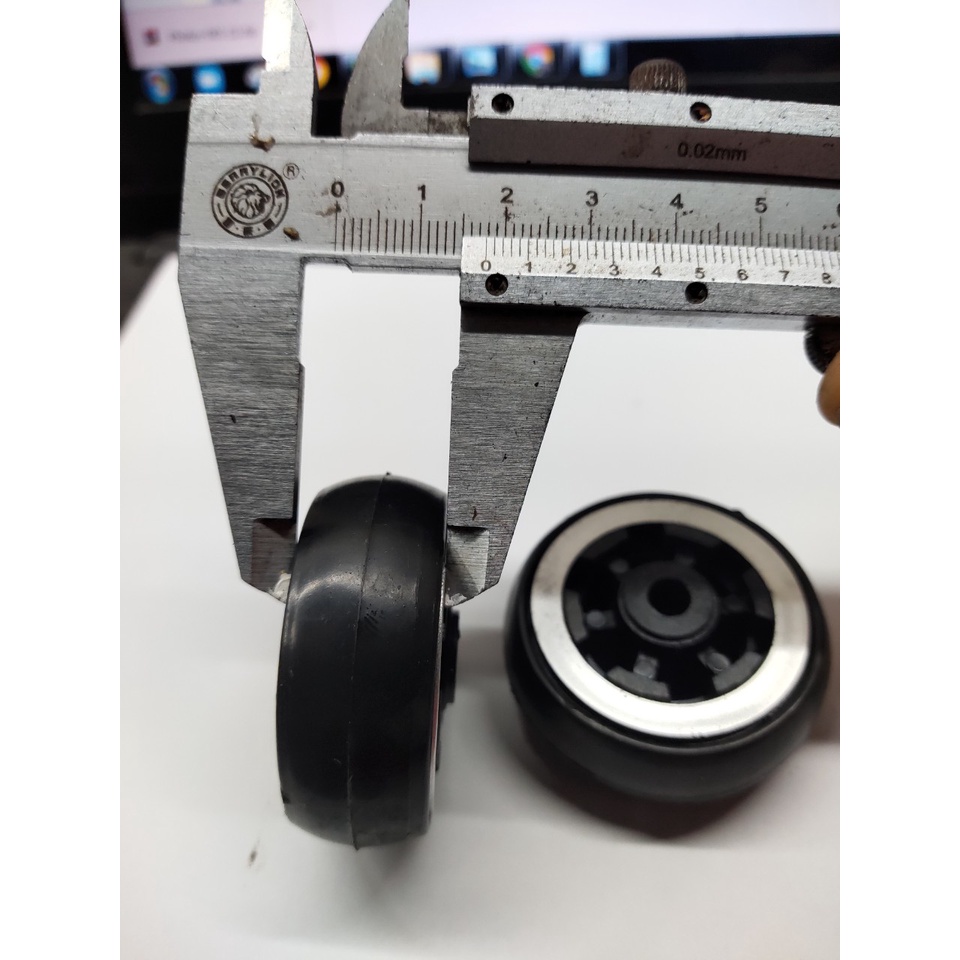 Hai bánh xe vali 48mm dùng thay thế bánh xe vali bị bong cao su chất liệu bền đẹp sử dụng lâu dài