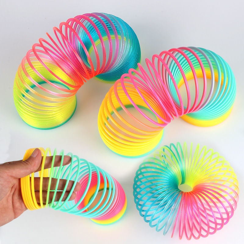 Đồ Chơi Lò Xo Bằng Nhựa Màu Cầu Vồng Sặc Sỡ Cho Bé