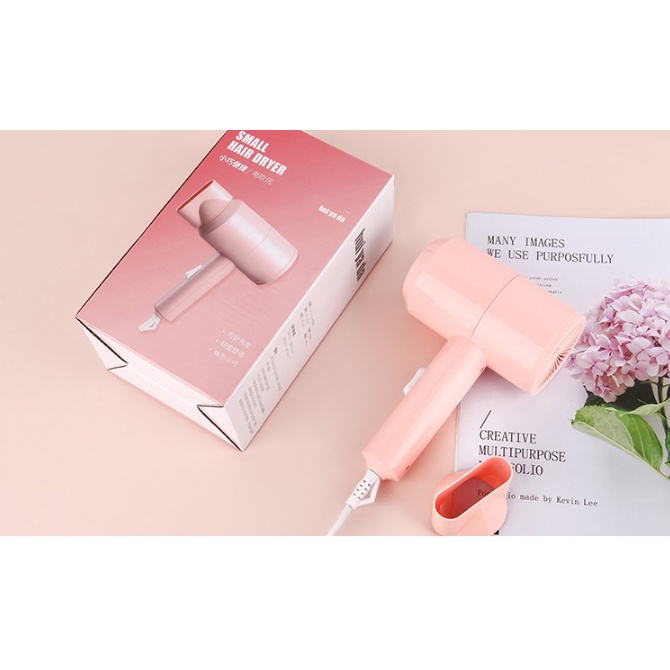 Máy sấy tóc mini tạo kiểu không gây hư tổn tóc tiện Lợi