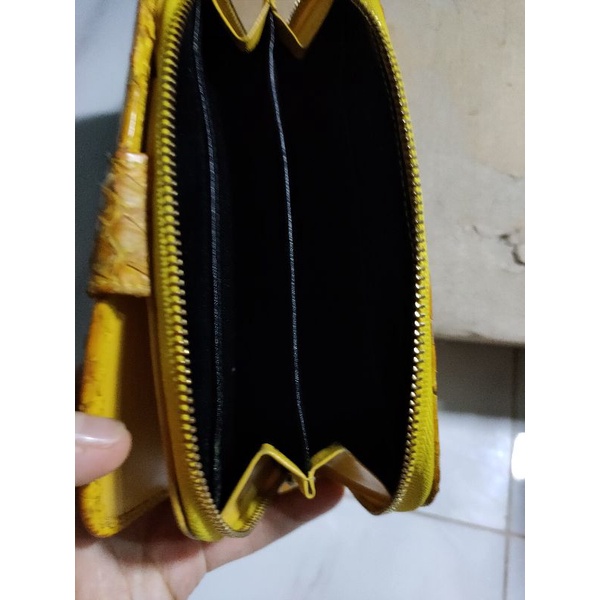 Ví cầm tay da t.r.ă.n