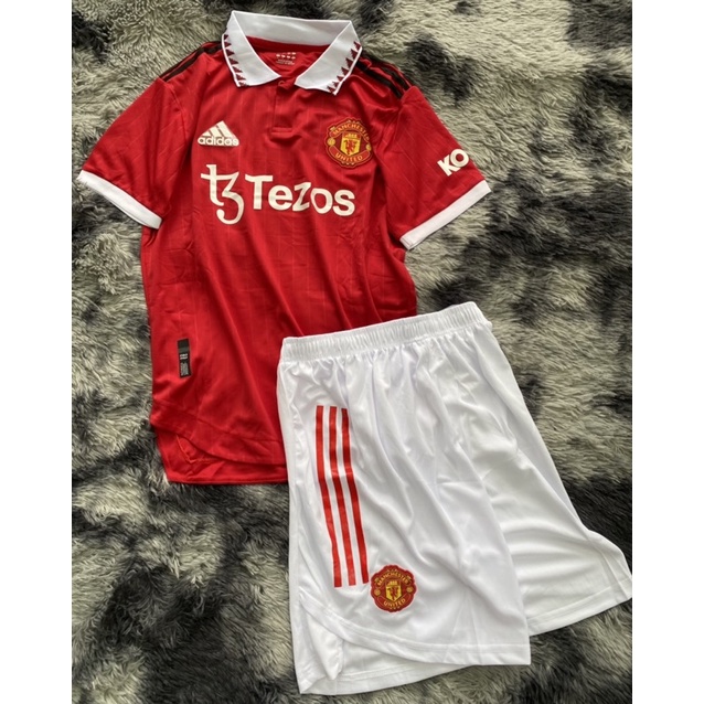 Set bộ quần áo thể thao bóng đá nam nữ clb mu manchester united teroz áo đỏ quần trắng xẻ tà 202: