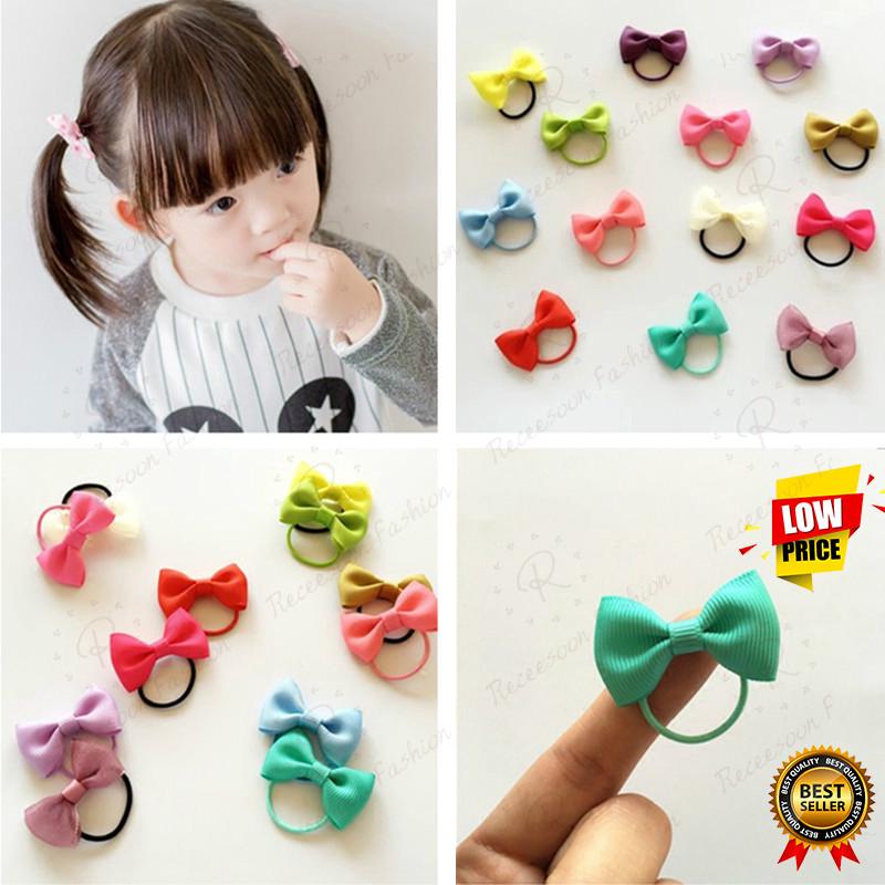 Dây buộc tóc đính nơ xinh xắn cho bé gái