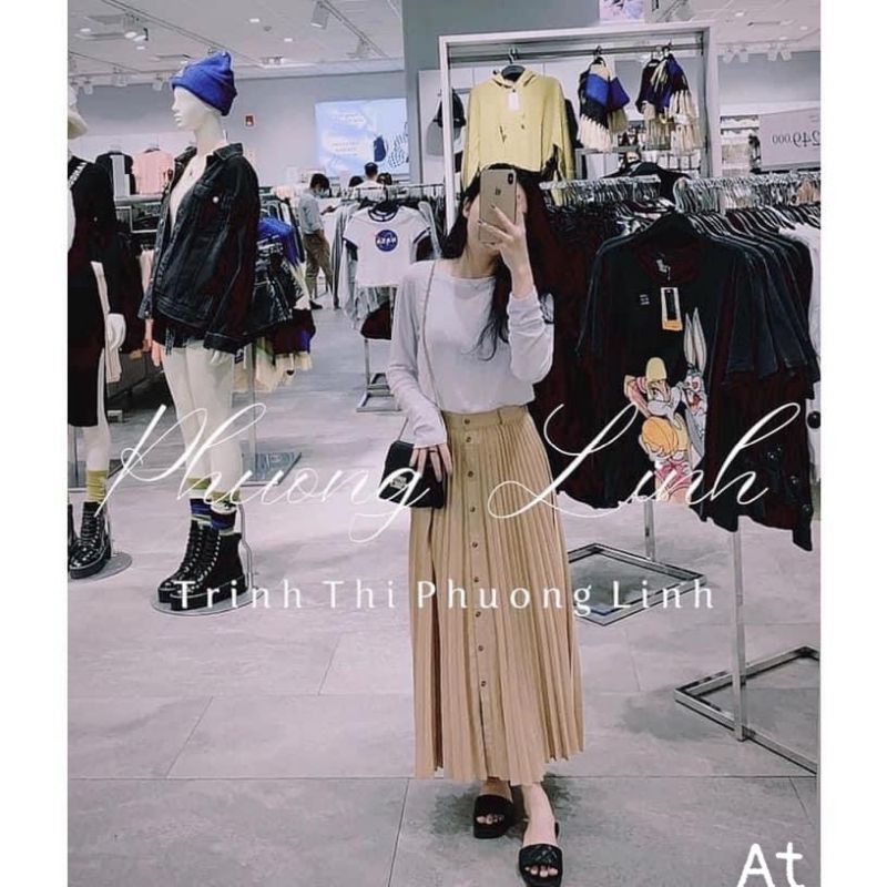 CHÂN VÁY MIDI BE KHUY GỖ