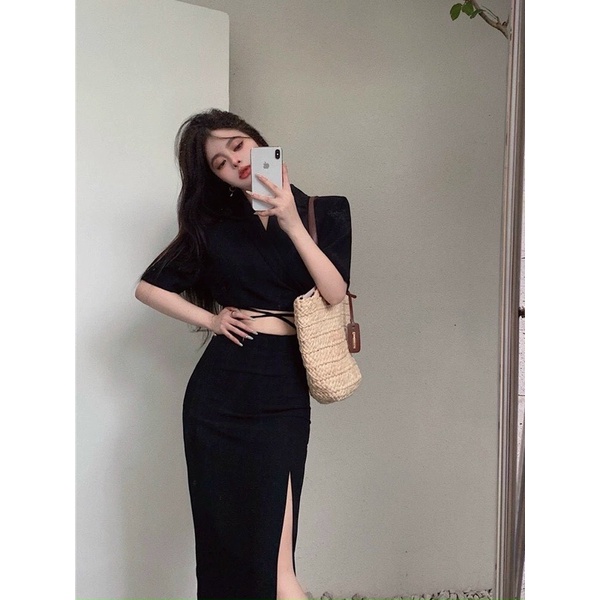 Set áo croptop cổ vest quấn eo + chân váy midi xẻ đen