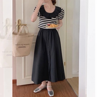 Chân váy chữ A cúc giữa