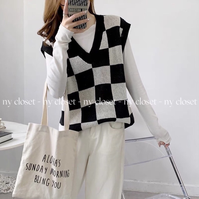 Áo gile len fom dấu quần.