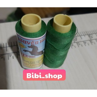 Cuộn chỉ màu xanh rêu ( màu xanh công an )