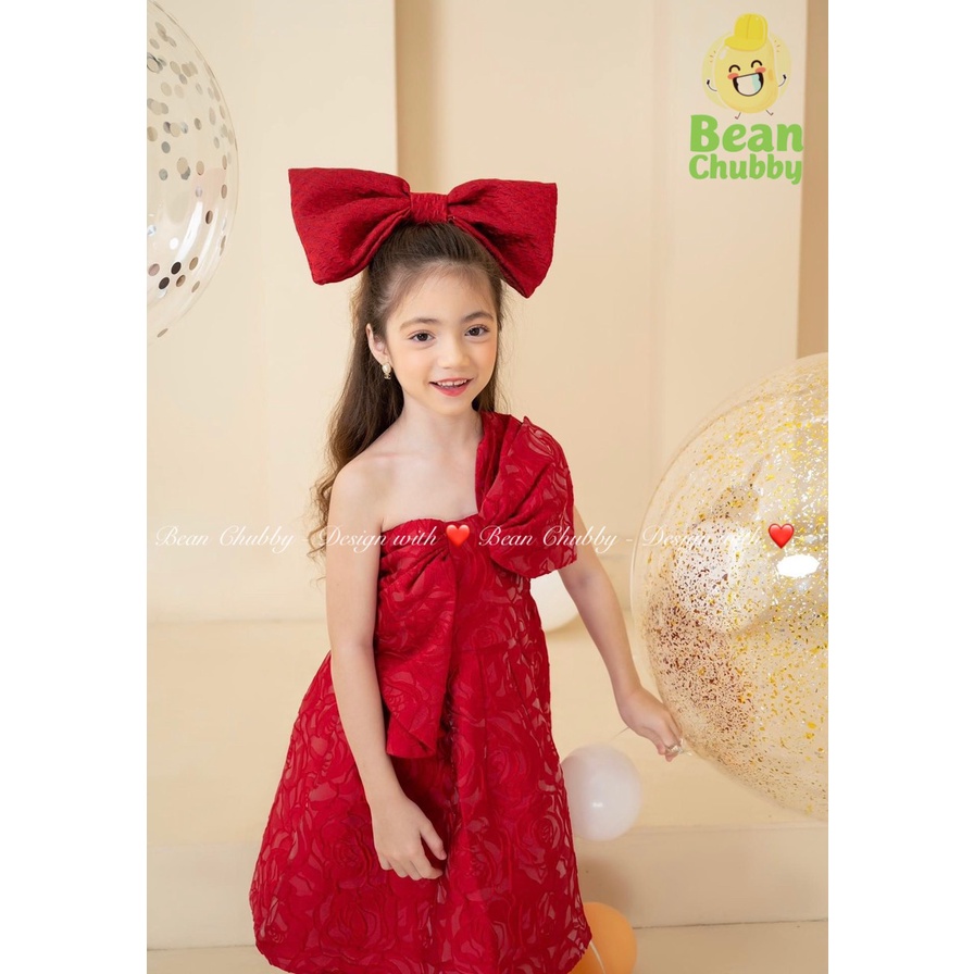 Đầm công chúa lệch vai nơ ngực vải xốp nhăn kèm nơ cặp tóc Shushibaby