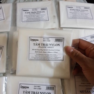 Tấm lót trải nilon tắm trắng giảm béo trong spa.