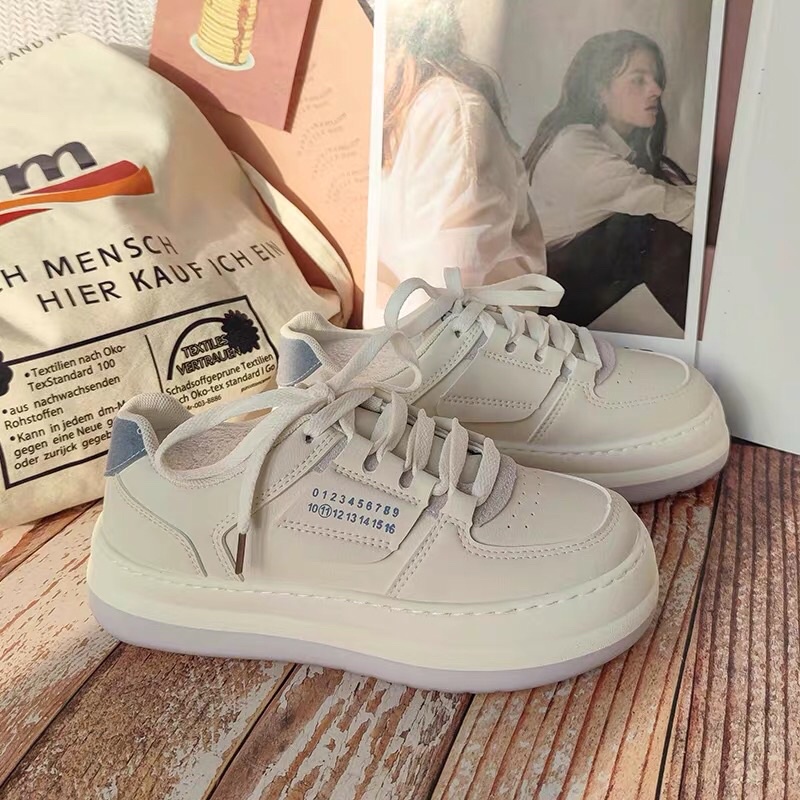 Giày thể thao nữ số 11 màu kem gót xanh đen