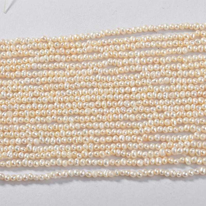 Chuỗi dây hạt trai 2-3mm làm vòng ( khoảng 130 hạt)