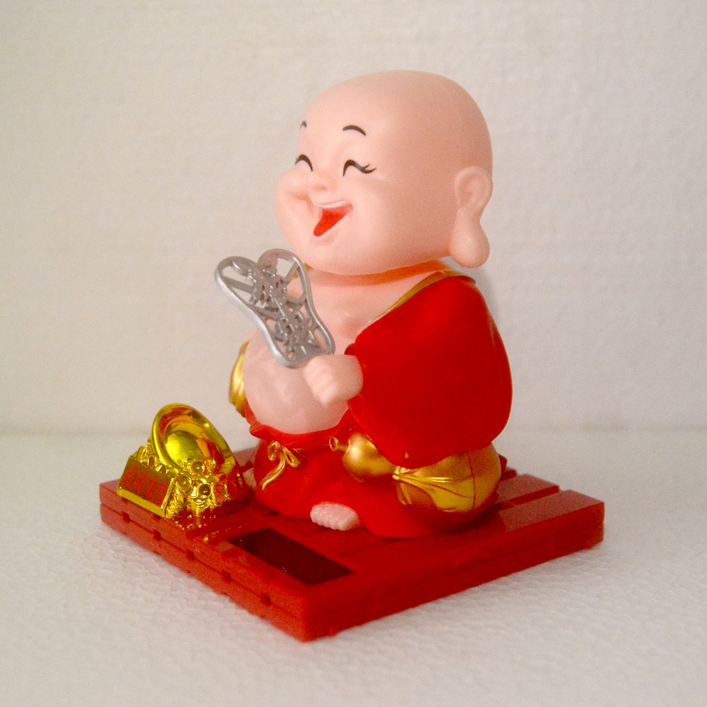 Tượng Di Lặc vẫy quạt-Thần tài thỏi vàng-Con lân gật đầu năng lượng mặt trời