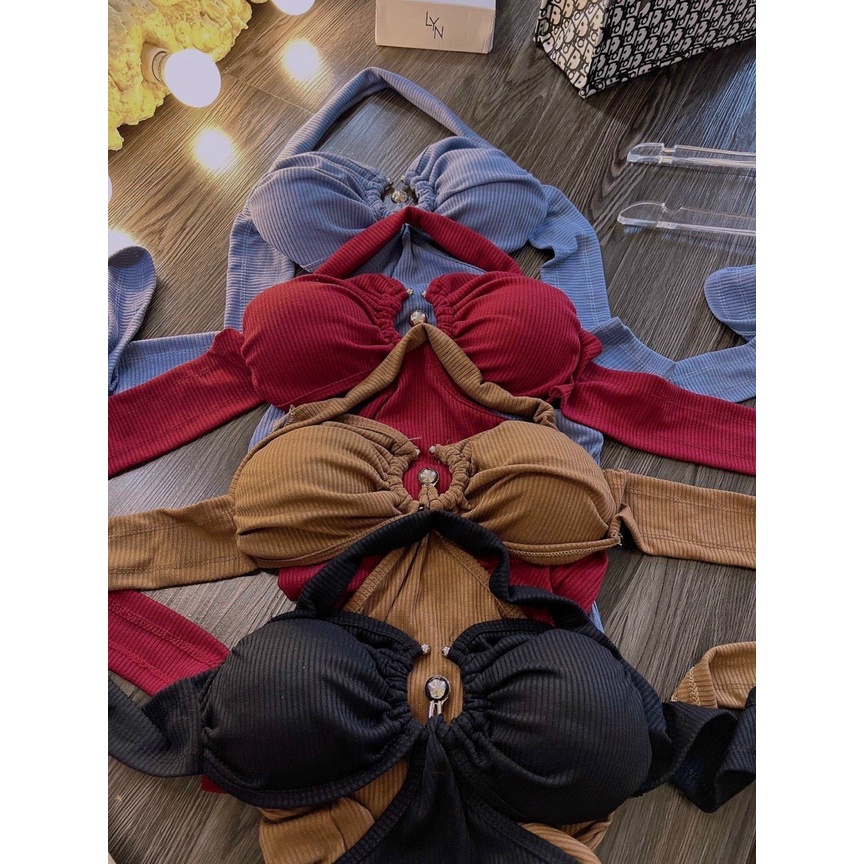 Đầm yếm khoen giữa 3 bi khoét 2 bên eo ôm cột dây nơ lưng cực sexy , chất thun gân dày dặn ly