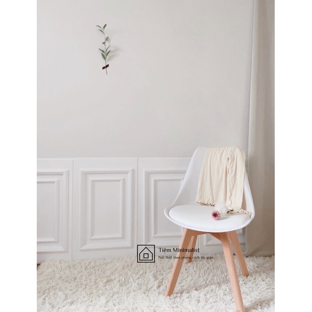 Ghế eames có đệm chân gỗ chắc chắn