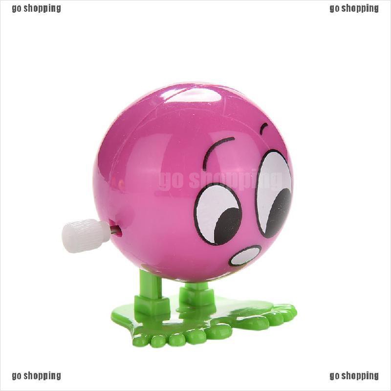 {go shopping}1 Pcs Wind up Face Colorful Funny  Cartoon Somersault Running Clockwork  Toys