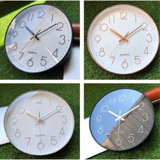 Đồng hồ treo tường kim trôi mạ vàng QUARTZ. sang trọng lịch lãm BH 12 tháng
