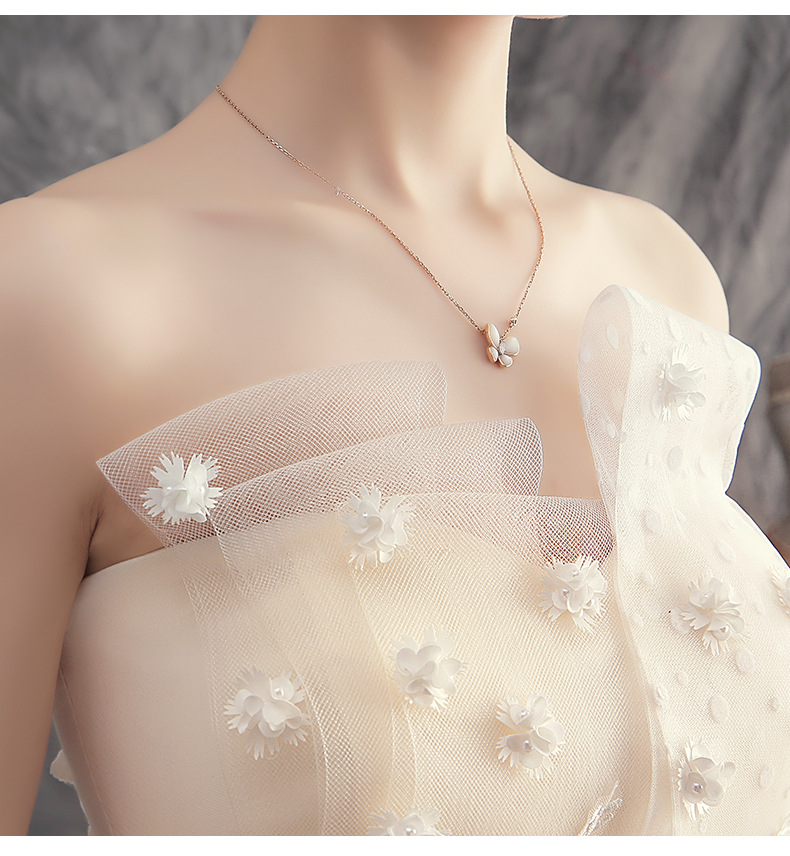 Váy cưới cô dâu phong cách mới rượu sâm banh khí chất bãi cỏ mộng mơ thời trang váy cưới bên bờ biển