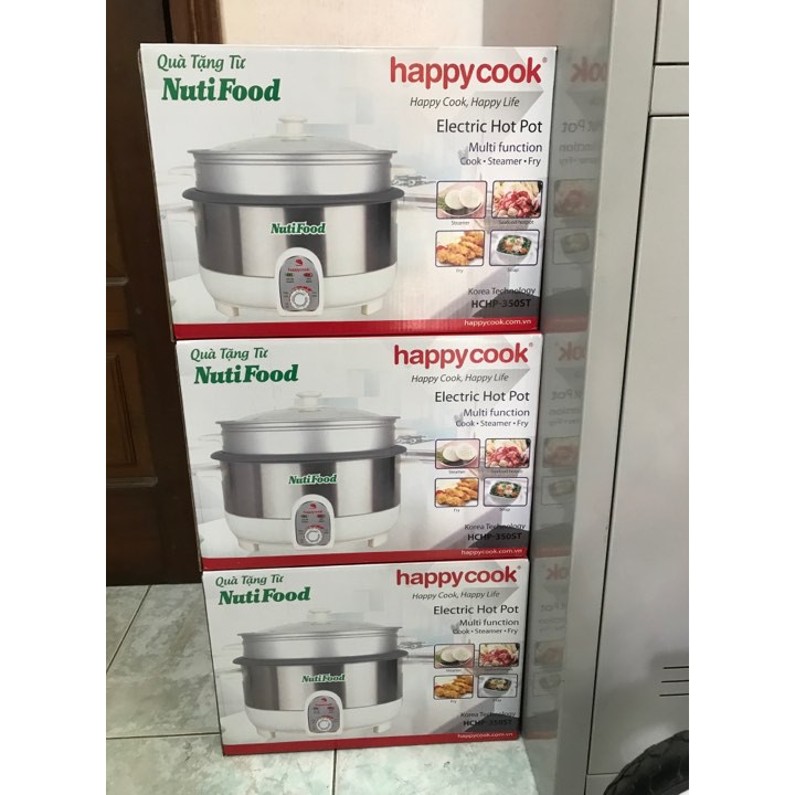 Nồi lẩu điện đa năng nắp kính có xửng hấp Happy Cook - quà tặng từ Nutifood