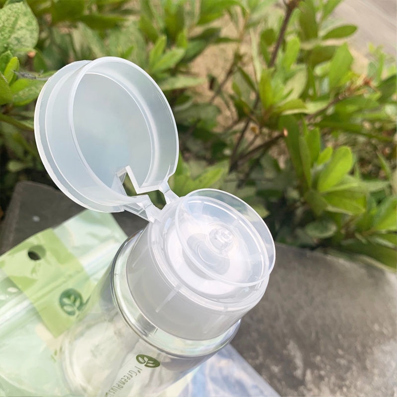 Chai rỗng nắp gập có thể nhấn và lấy lười biếng 100ml có thể chứa nước tẩy trang, nước trang điểm trong suốt và có thể ấn bằng một tay