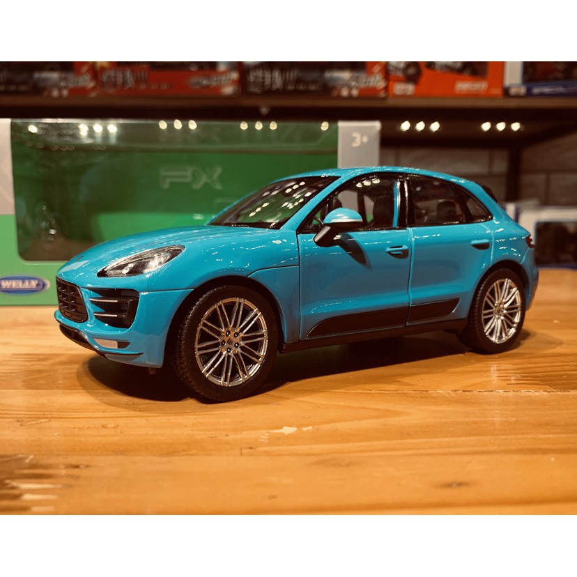 Mô hình xe ô tô Porsche Macan Turbo Hãng Welly FX tỉ lệ 1:24 màu xanh