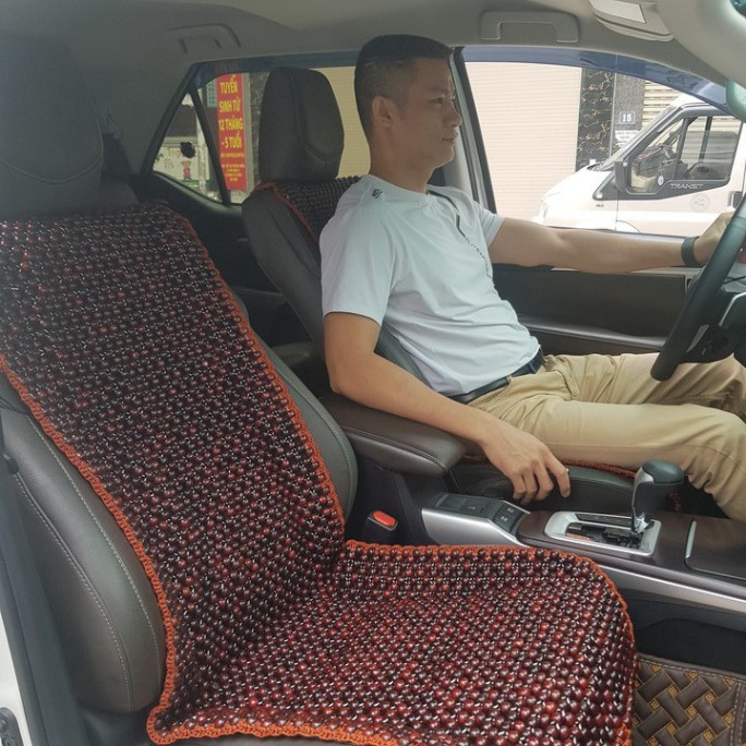 Sản Phẩm Đệm hạt gỗ tựa lưng massage ghế ô tô, kiêm dải lót hàng ghế sau 100% gỗ Cẩm Lai tự nhiên. Dạng đan kết diềm mép