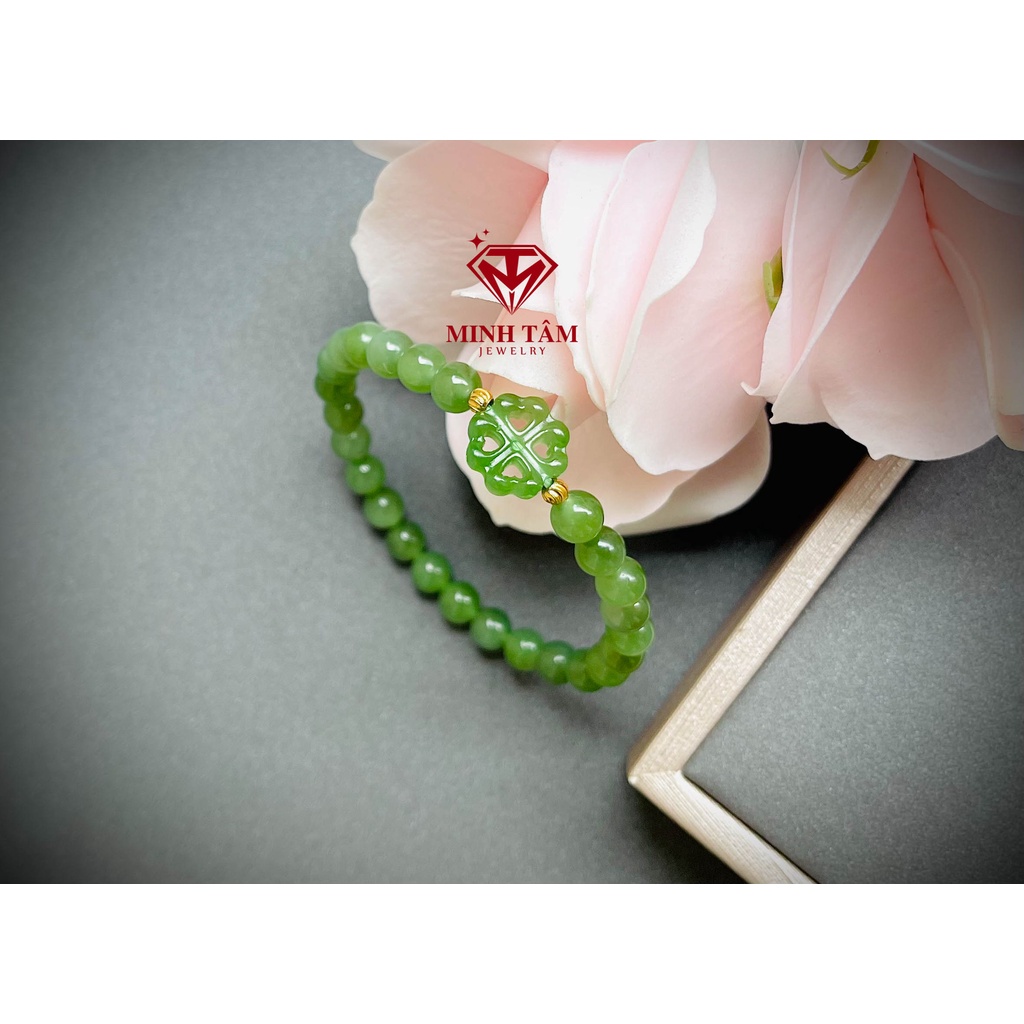 Vòng tay Ngọc Hòa Điền 6 ly mix charm sen, cỏ bốn lá, lu thống ngọc xanh lá bi Au 10k-Minh Tâm Jewelry