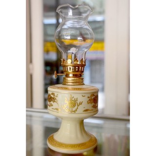 đèn dầu sứ rồng vàng