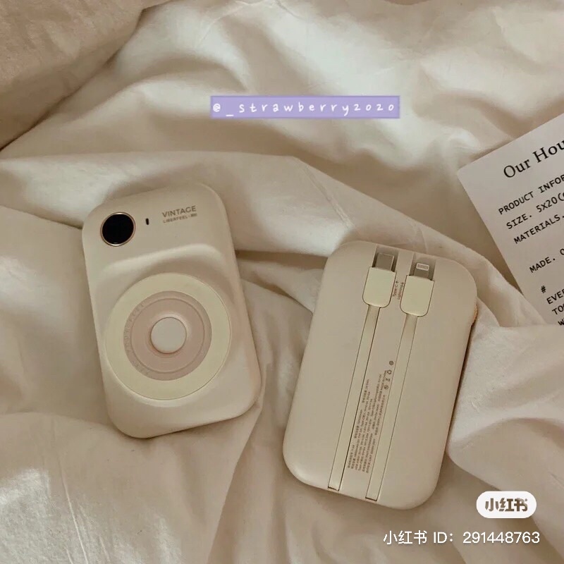 Sạc pin dự phòng không dây có hai dây cắm màu pastel