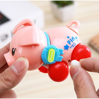 Đồ chơi heo lên dây cót cho bé