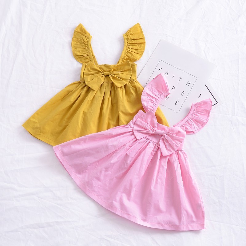 Đầm xòe công chúa đính nơ cho bé gái