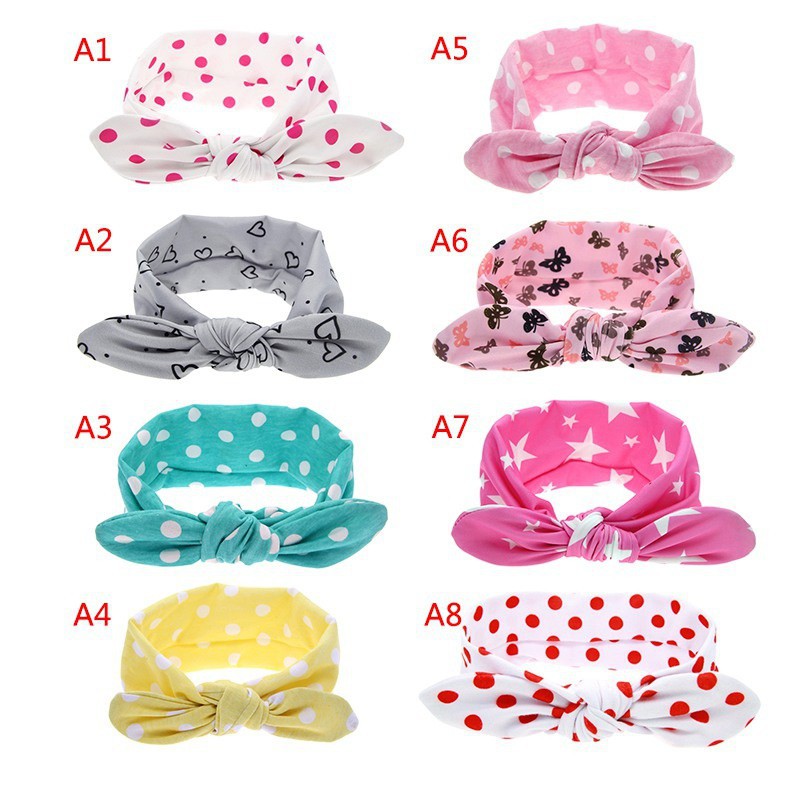 Băng đô chấm bi đàn hồi cho bé gái