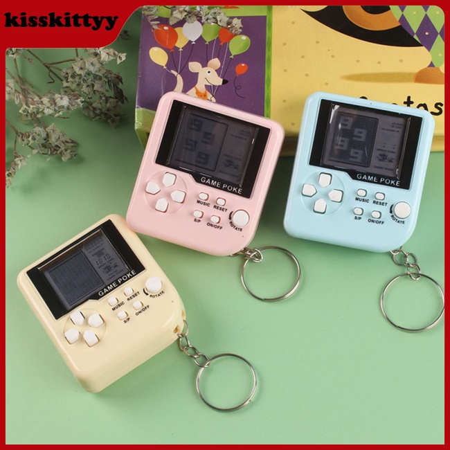 Máy Chơi Game Điện Tử Cầm Tay Mini Nhiều Màu Dễ Thương Kèm Móc Khóa