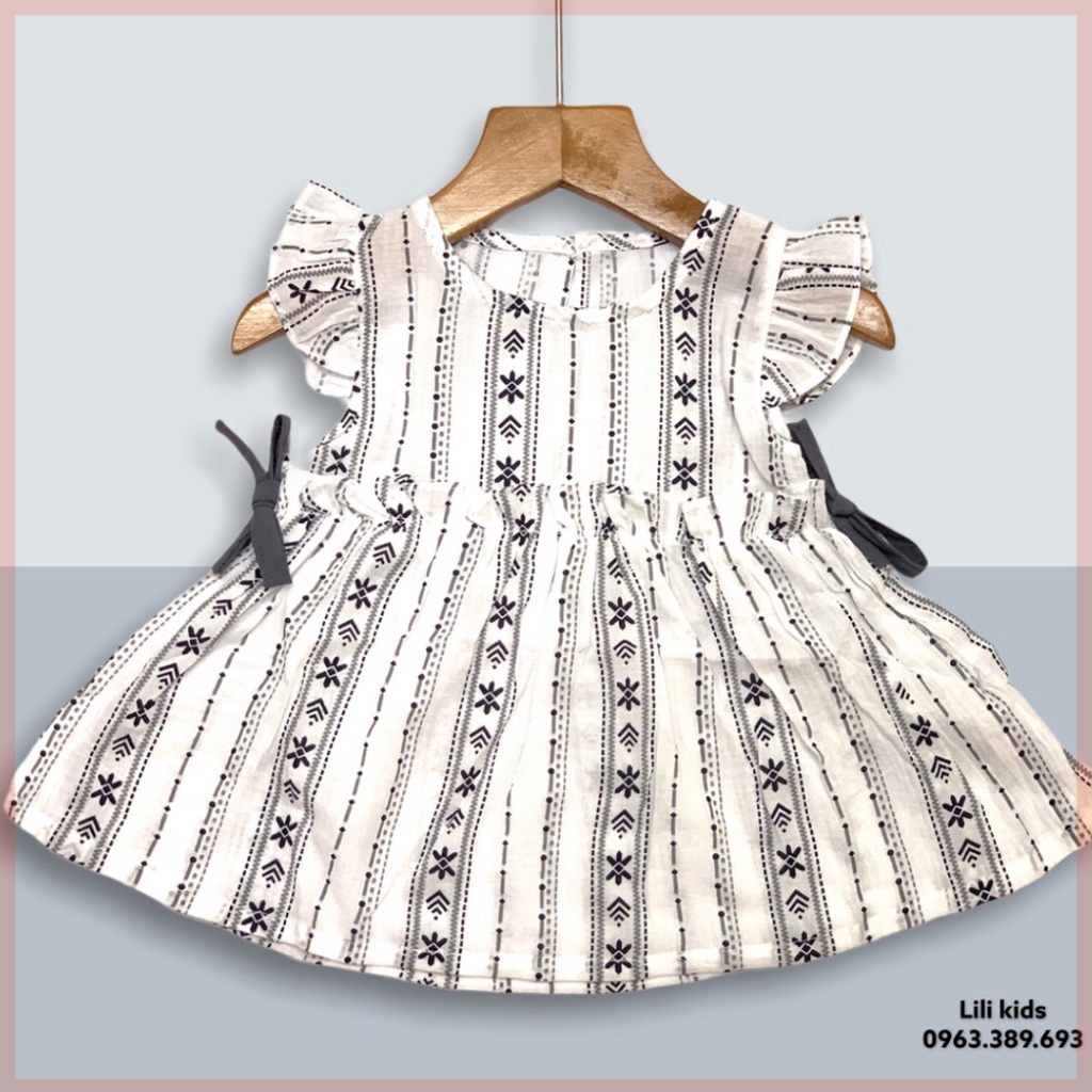 váy bé gái cánh tiên baby, cotton mầu trắng họa tiêt, nơ điệu đà cho mùa hè