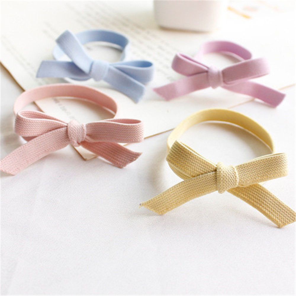 Dây buộc tóc cao su co giãn đính nơ đáng yêu cho nữ