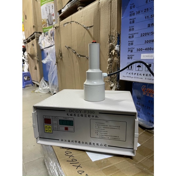 Máy seal màng nhôm chai đường kính nhỏ, máy seal màng nhôm chai lọ nắp nhọn, máy seal nắp hình nón