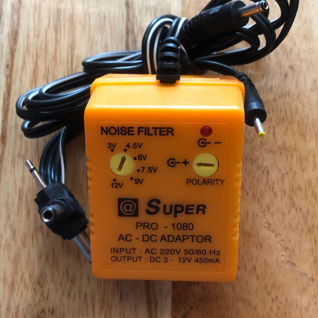 Nguồn Adapter đa năng SUPER 1081 1000MA và 450MA 3-13,5V, 6 đầu ra Đảo cực được