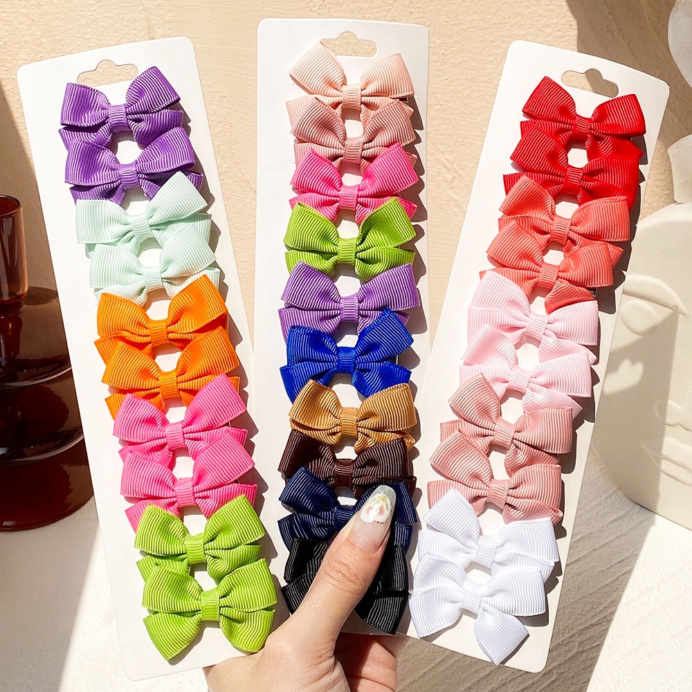 Set 10 kẹp tóc nơ KIDSBOWS bằng kim loại màu trơn phong cách Hàn Quốc thời trang cho bé gái
