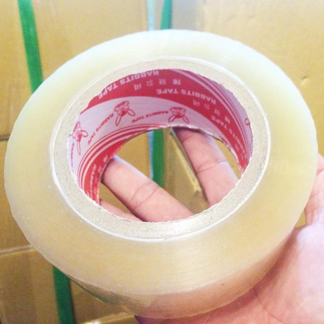 1 CUỘN BĂNG KEO DÁN BỌC NI LÔNG TRONG ĐỤC SIÊU DÍNH DÀY 100 YARD DÙNG ĐÓNG THÙNG GÓI HÀNG HÓA