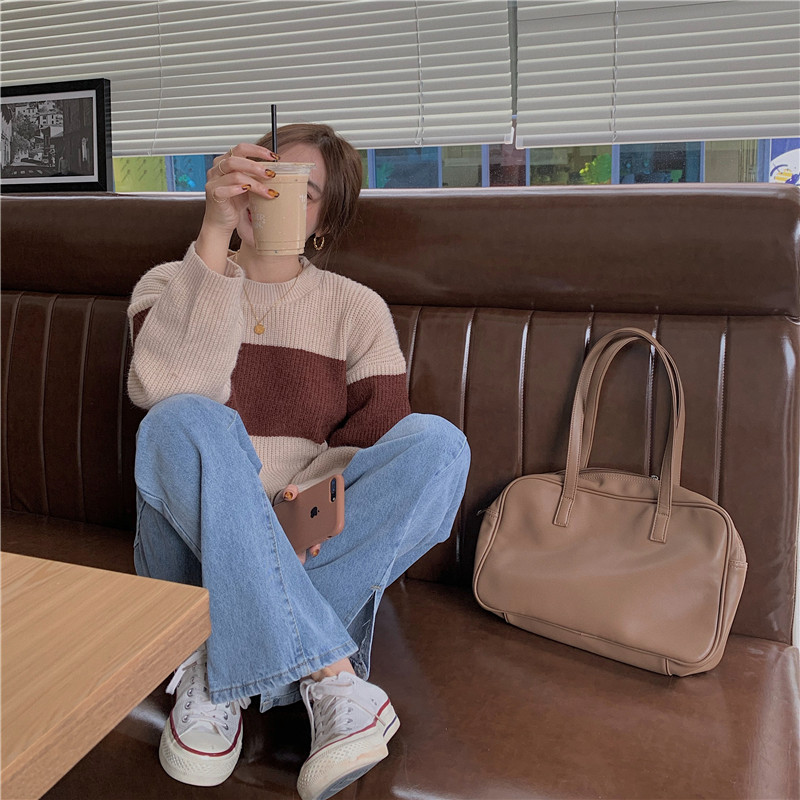 Áo sweater dệt kim tay dài dáng rộng kẻ sọc dành cho nữ