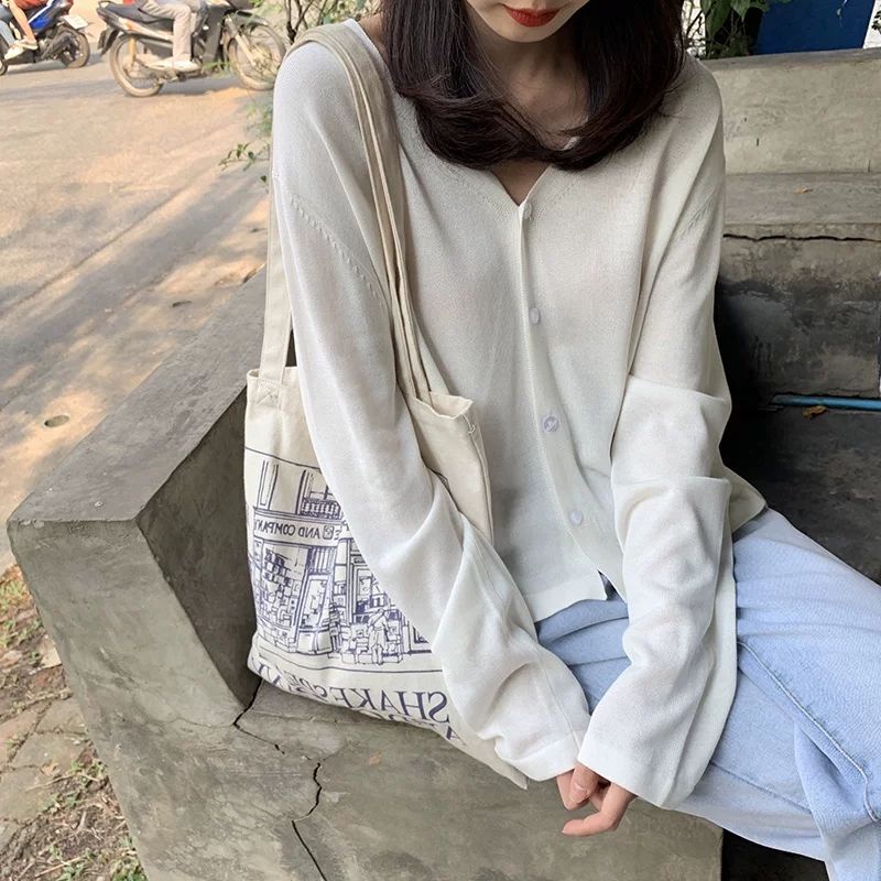 Áo cardigan dệt kim tay dài dáng rộng chống nắng thời trang mùa thu dành cho nữ