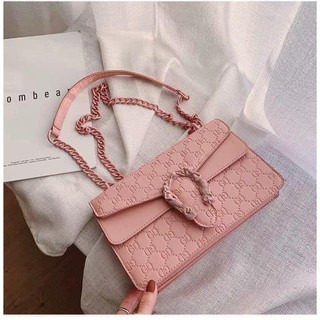 Túi đeo chéo nữ gc dập vân chìm đầu rồng