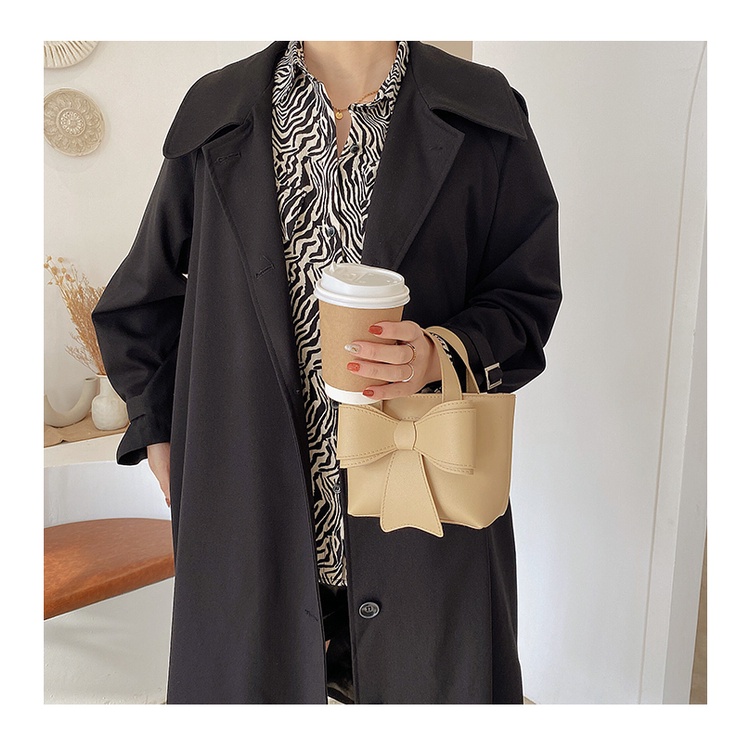 Túi Xách Da Cầm Tay Phối Nơ Xinh Xắn