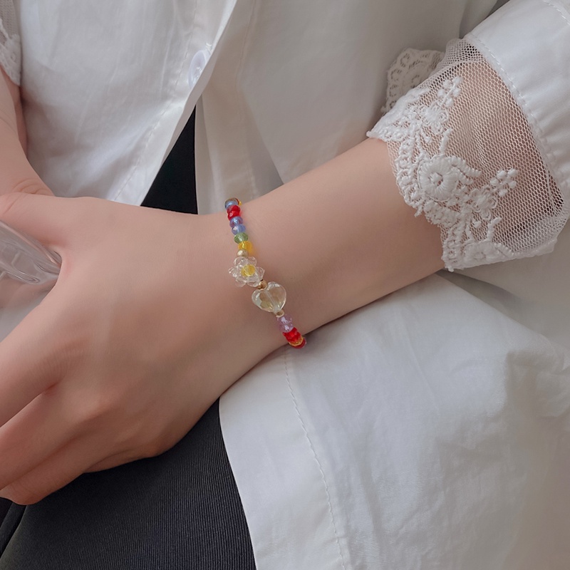 Vòng tay đính hạt thủ công hình hoa cúc phong cách Hàn Quốc