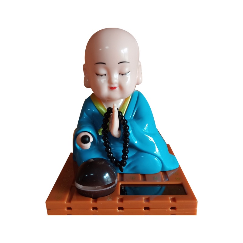 Tượng Thầy Chùa gõ mỏ tụng kinh
