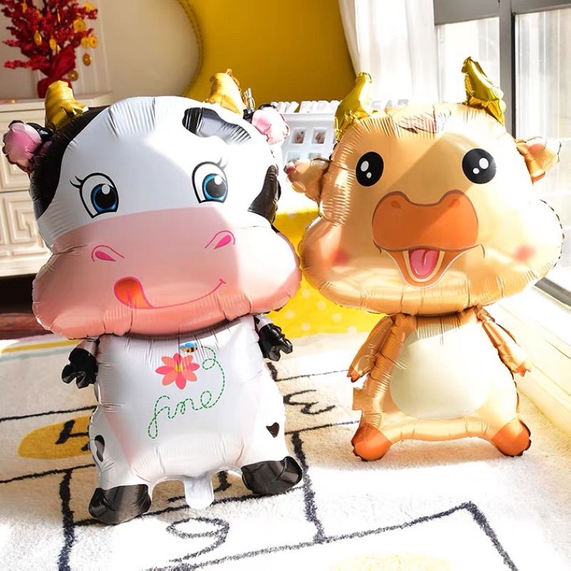 Bóng bay hình trâu vàng, bò sữa trang trí sinh nhật cho bé