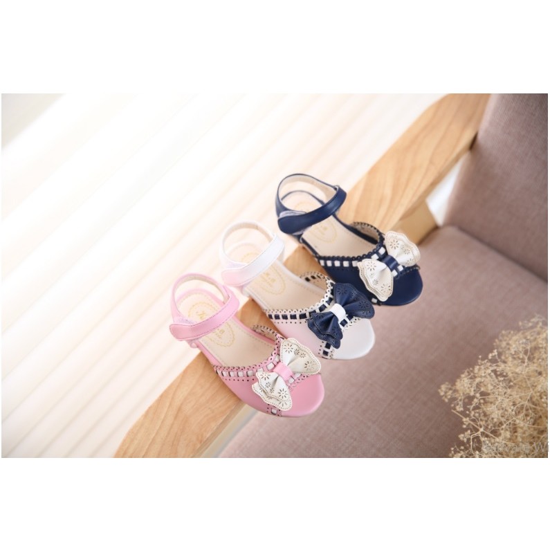 Sandal bé gái gắn nơ ren