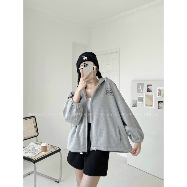 Áo khoác nỉ dây kéo form rộng, nón 2 lớp, có dây rút vạt áo in hình cô gái