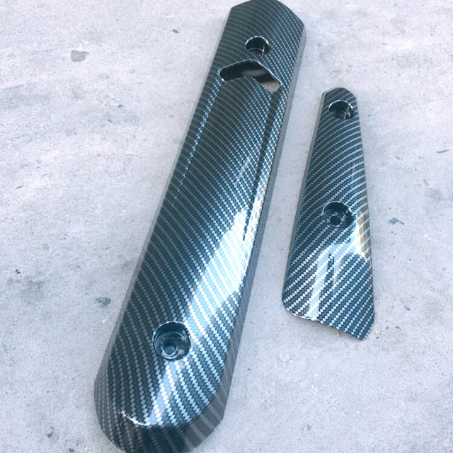 BỘ ỐP PÔ SPARK CACBON gồm 2 miếng nhựa chống cháy cao cấp như hình