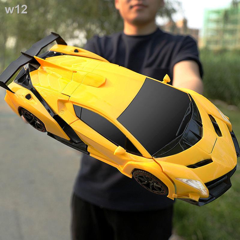 ✠™Điều khiển từ xa ô tô cảm ứng biến dạng sạc đồ chơi King Kong rô bốt trẻ em cậu bé đua xe